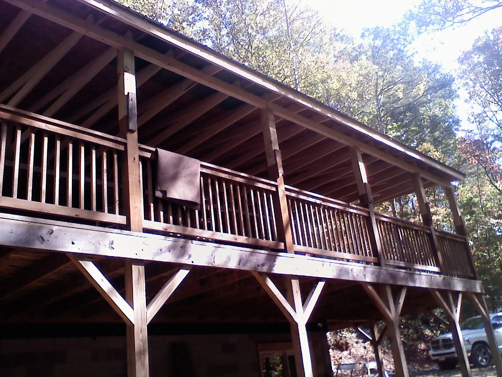 Timber framing under a new elevated porch and deck — Roof Leak Repair in Pilot Mountain by Roofing Brothers